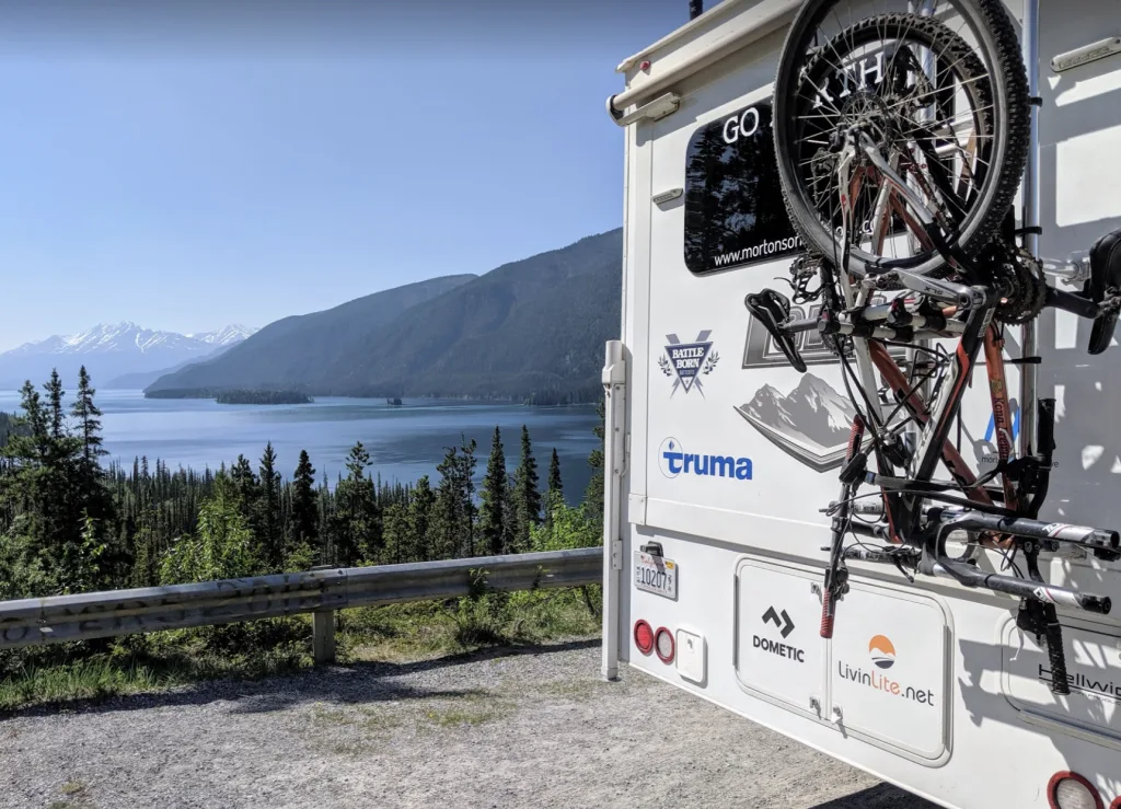 ladder-mounted bike rack on truck camper