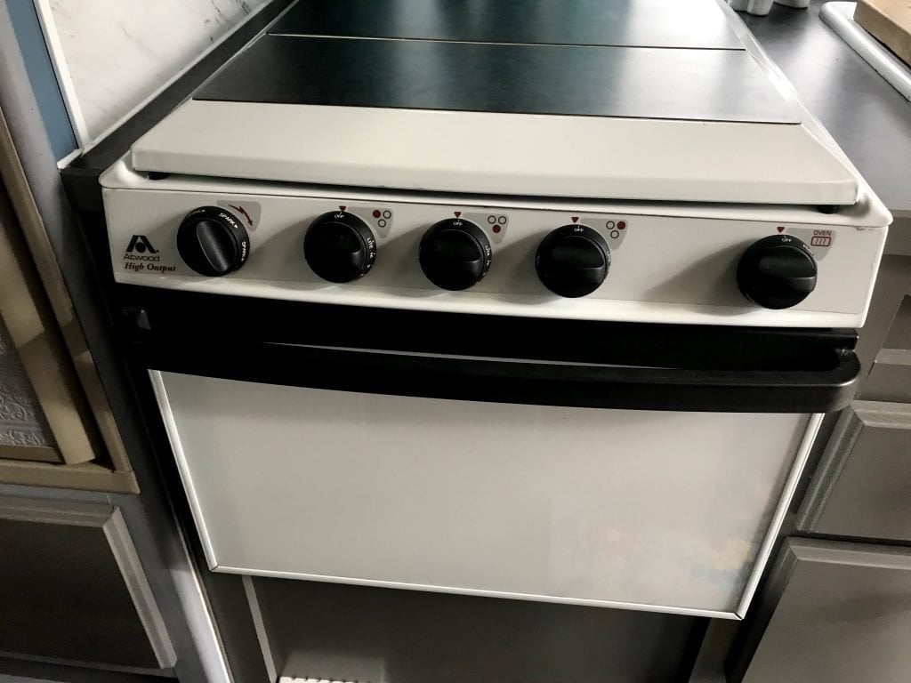 RV stove and oven with stove cover down