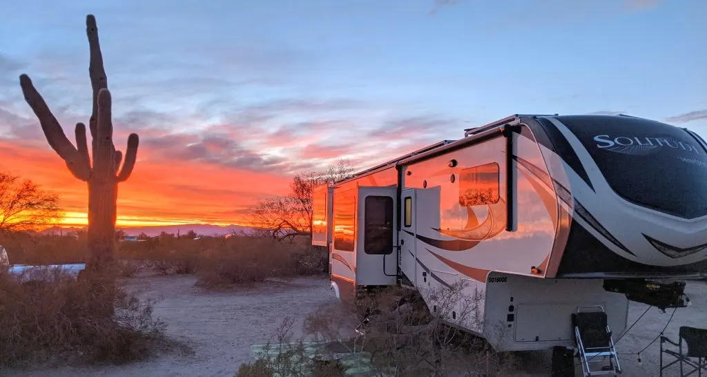 beautiful fifth wheel at sunset with cactus 