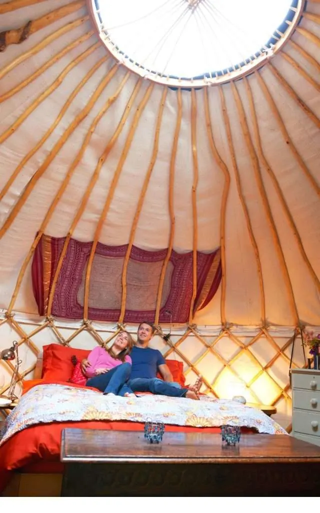 couple on yurt bed
