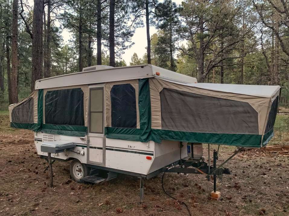 pop up camper in woods