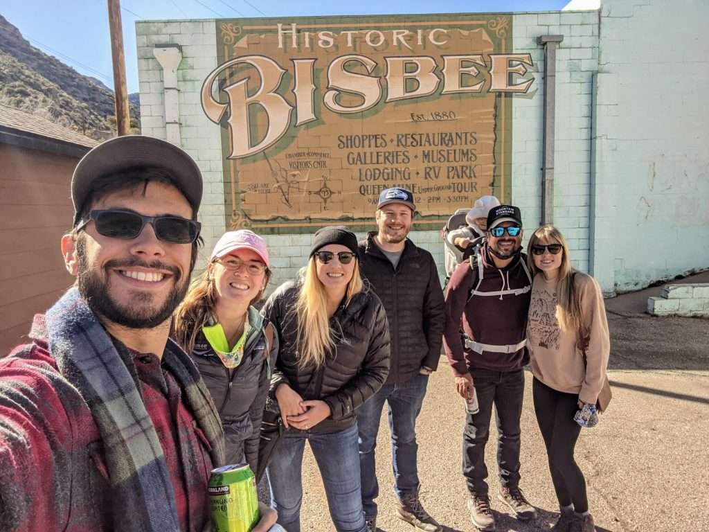 welcome to historic Bisbee arizona sign with mortons on the move, getaway couple and drivin and vibin
