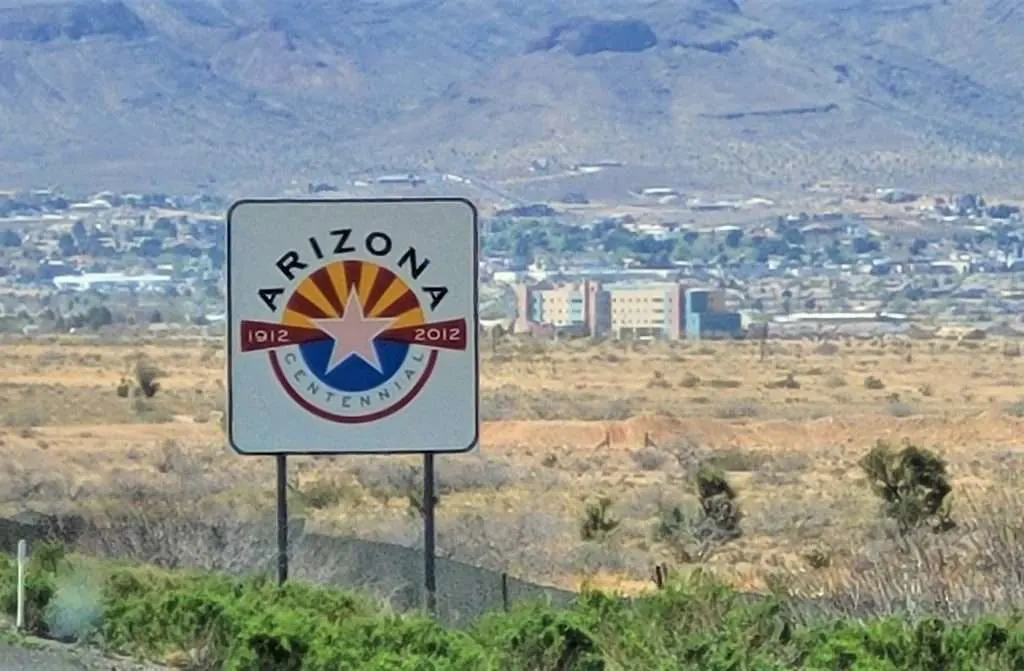 Arizona welcome sign along highway.