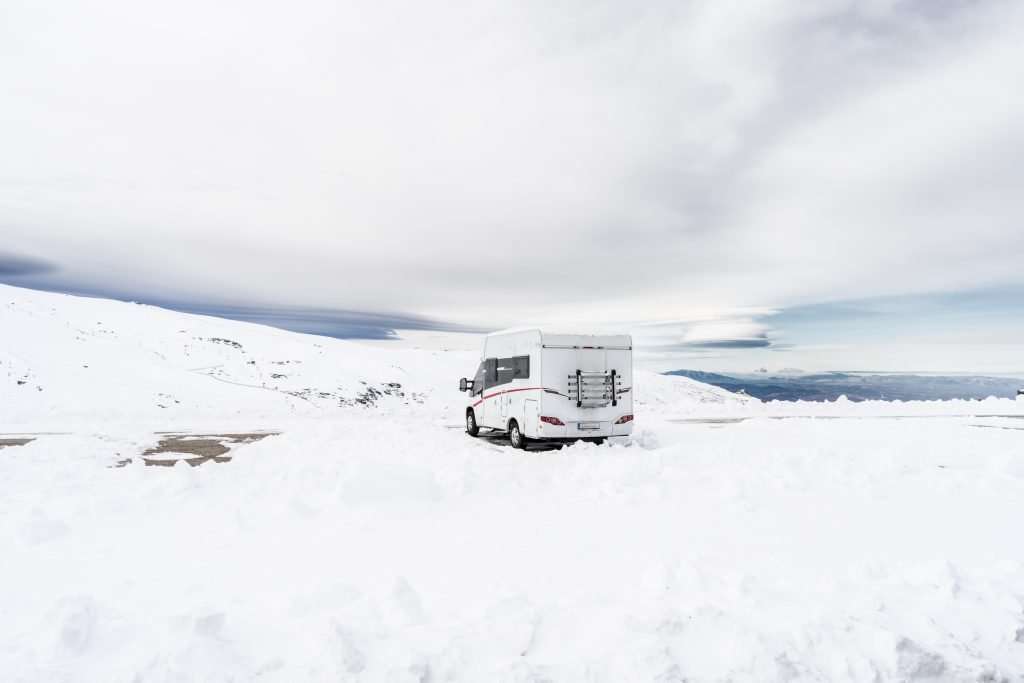 RV driving in snow.