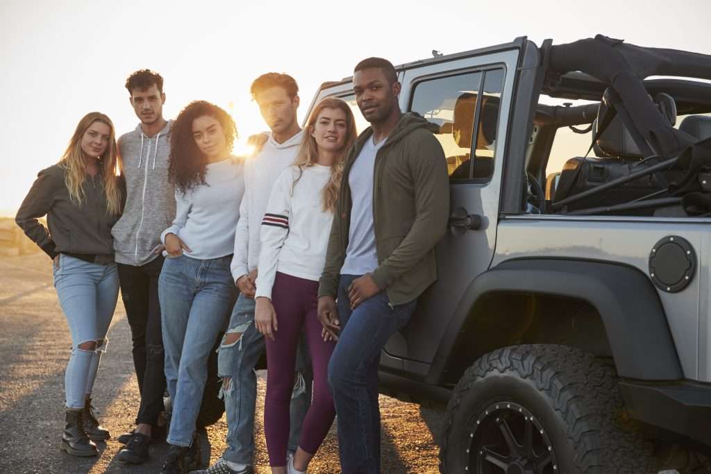 Group of friends on a road trip with their Jeep.