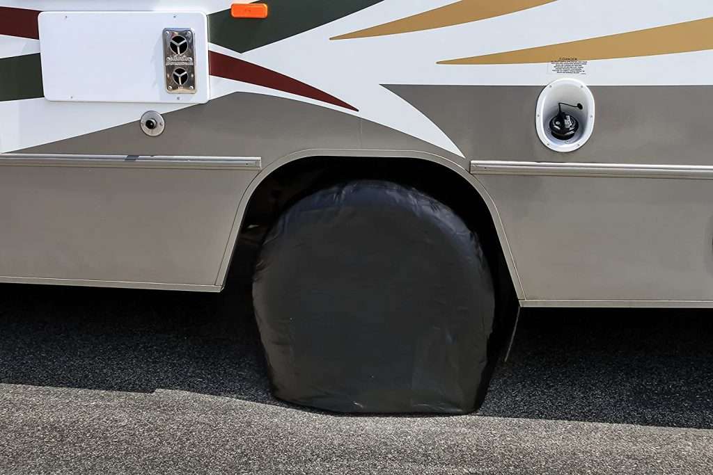 Camco tire covers on RV.