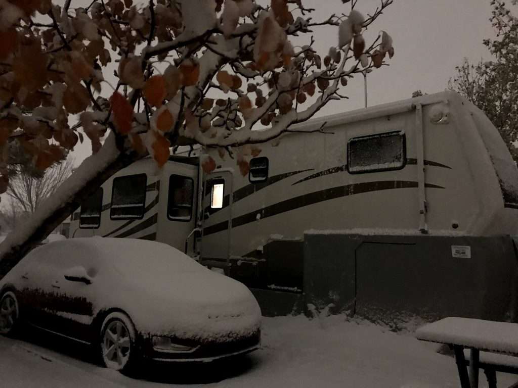 Snow covered fifth wheel