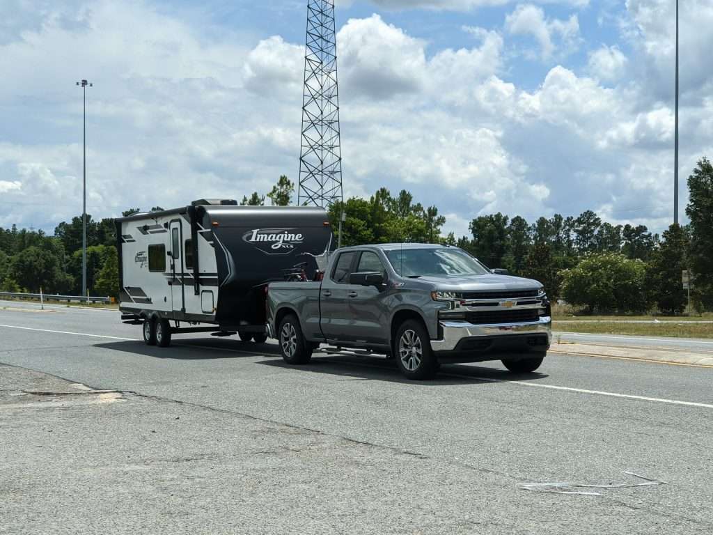 Truck towing a travel trailer