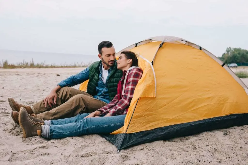 Couple in tent on the beach in Georgia.