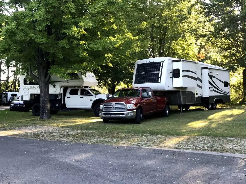 RVs parked at campsites.