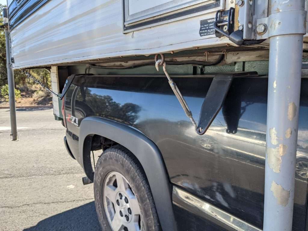 Close up of truck camper loaded onto truck.