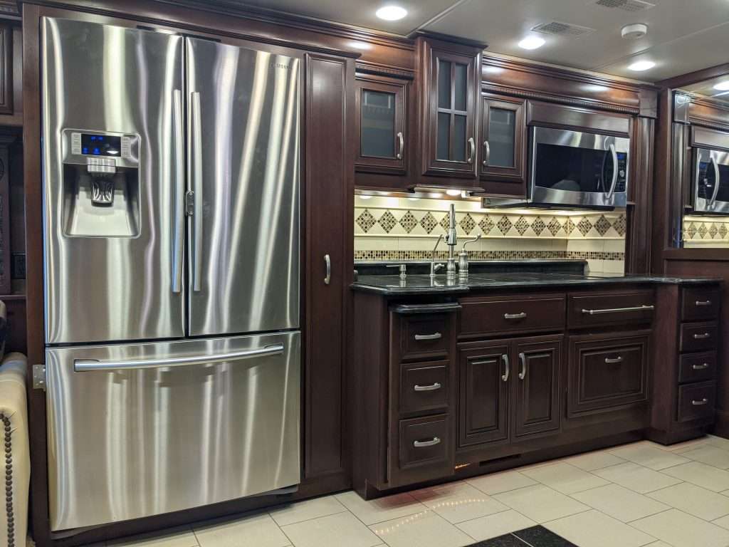 RV kitchen with products in it.