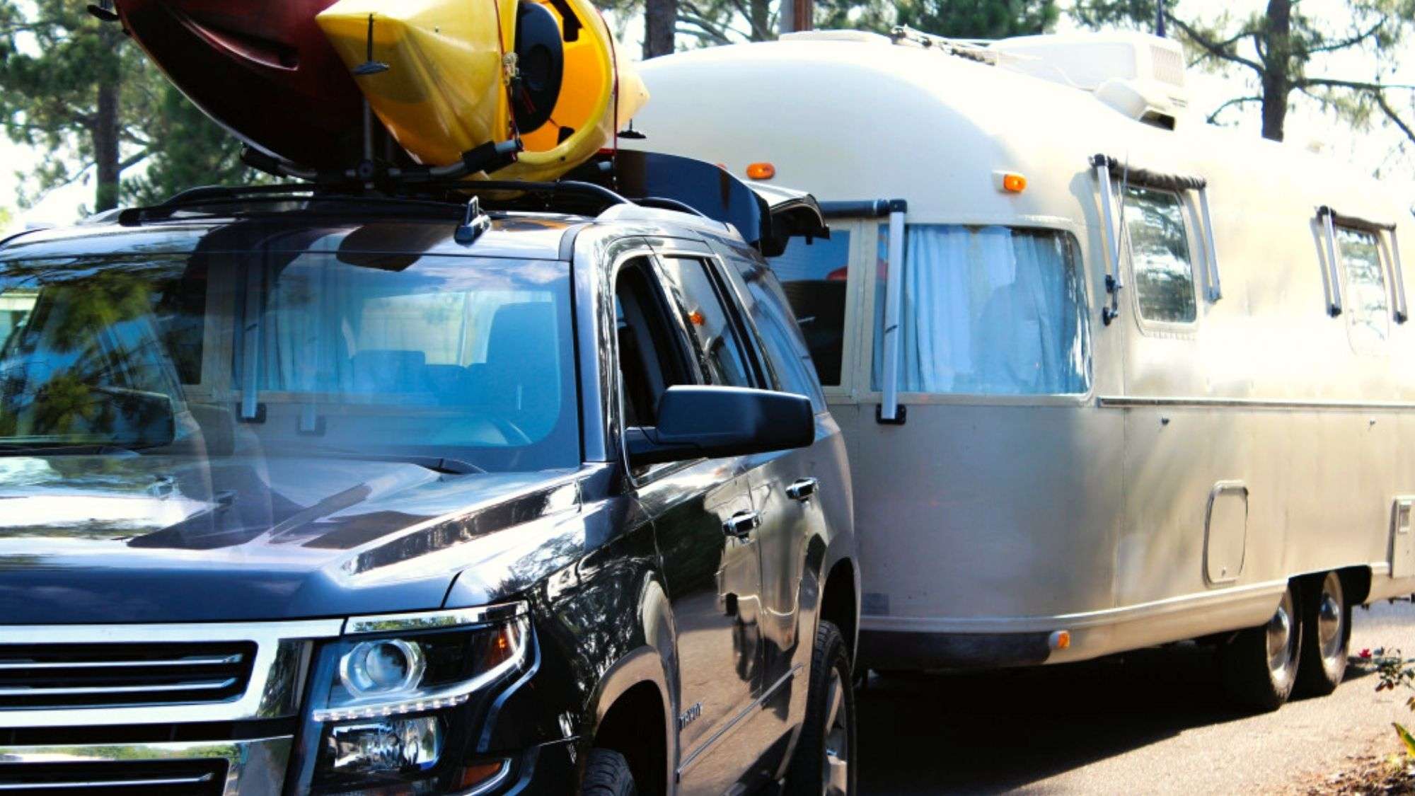 SUV towing RV camper