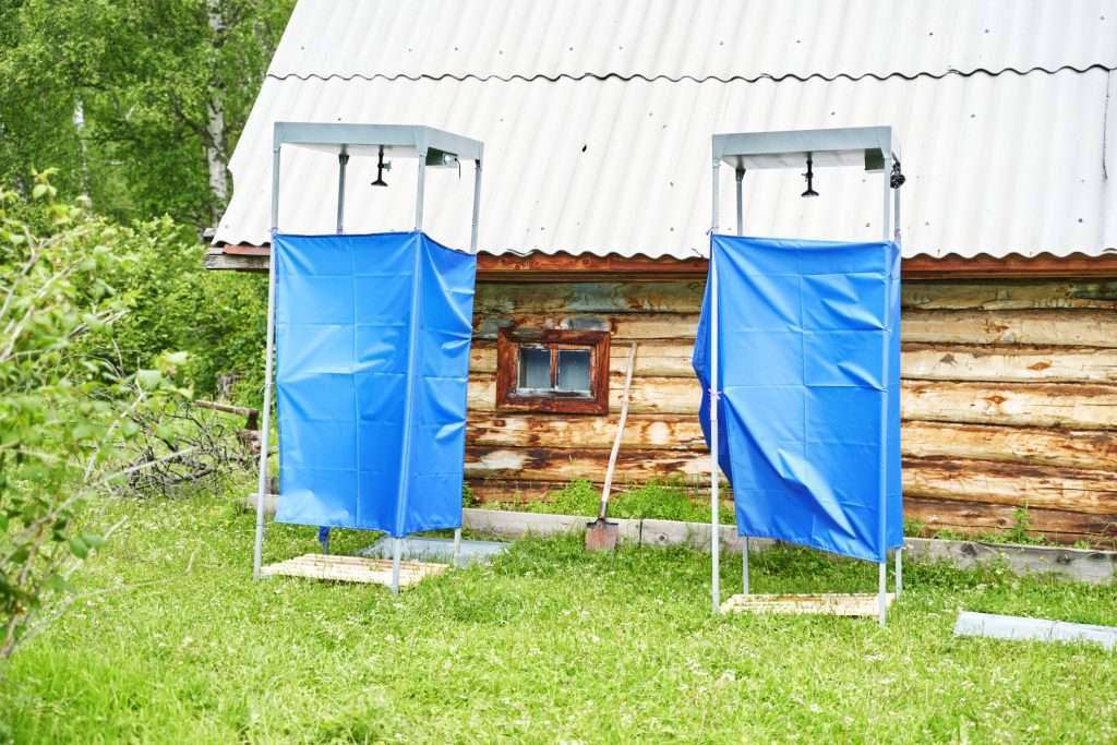 Two pop-up shower tents.