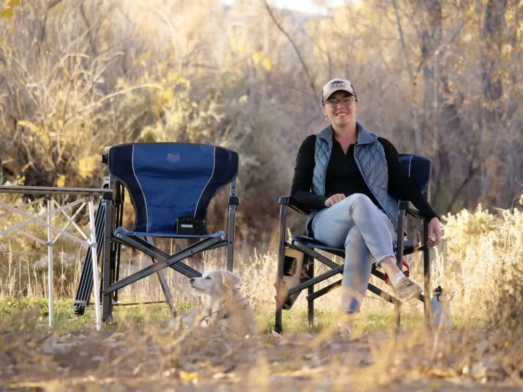 Cait sitting on camping chair