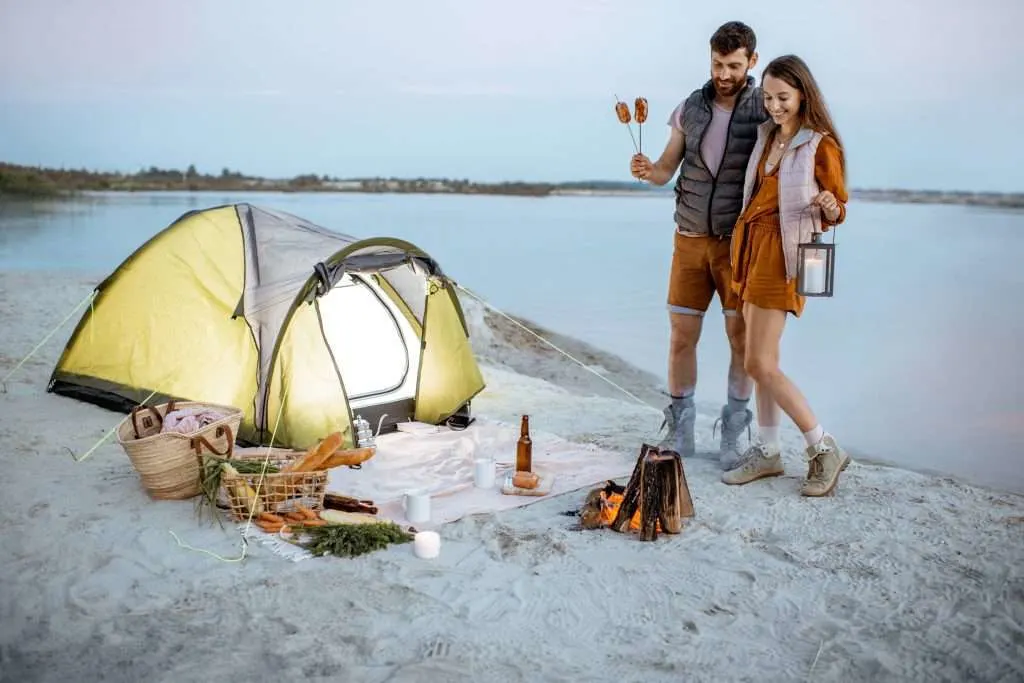 Couple beach camping.