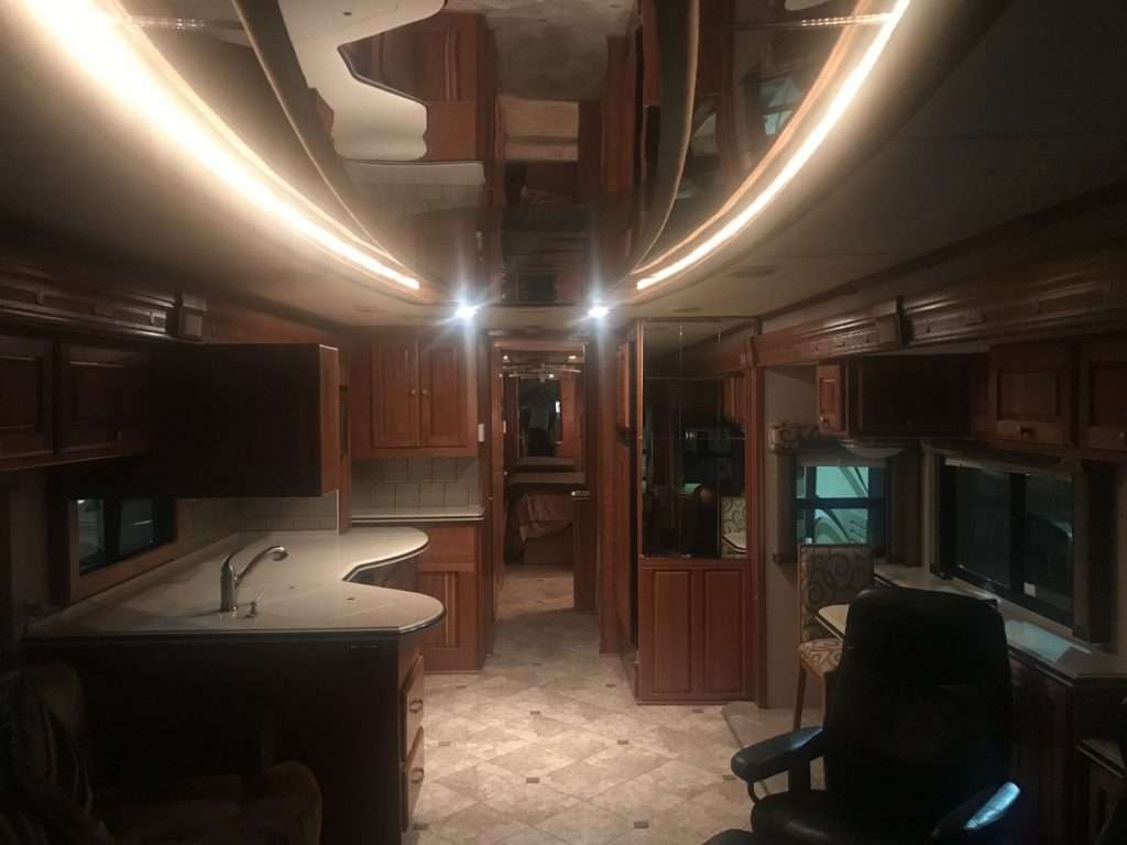 Interior of RV at night with LED lights.