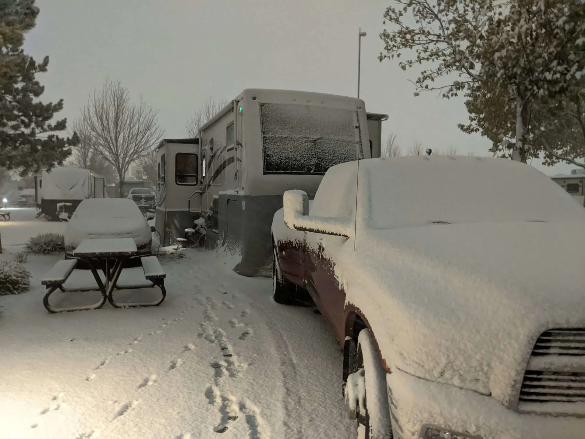 Mortons on the Move truck and RV covered in snow.