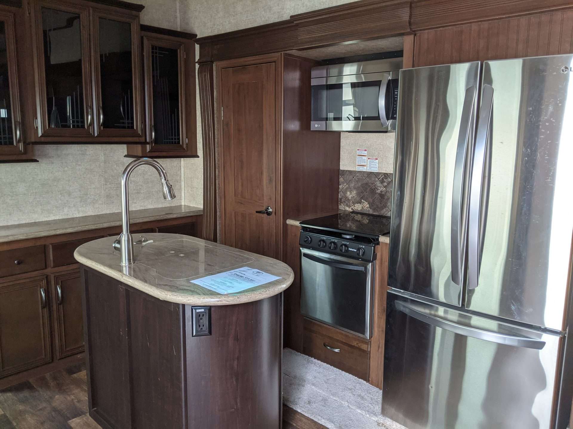 RV kitchen with sink cover.