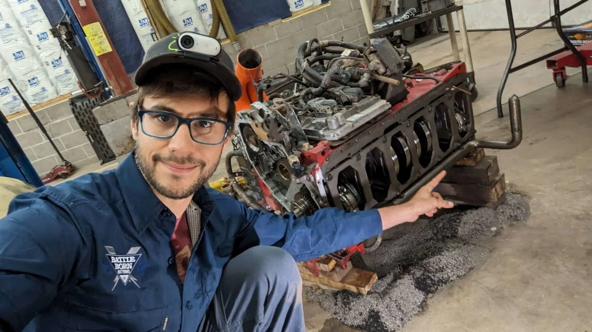 Tom doing a diesel engine rebuild on a cummins 6.7