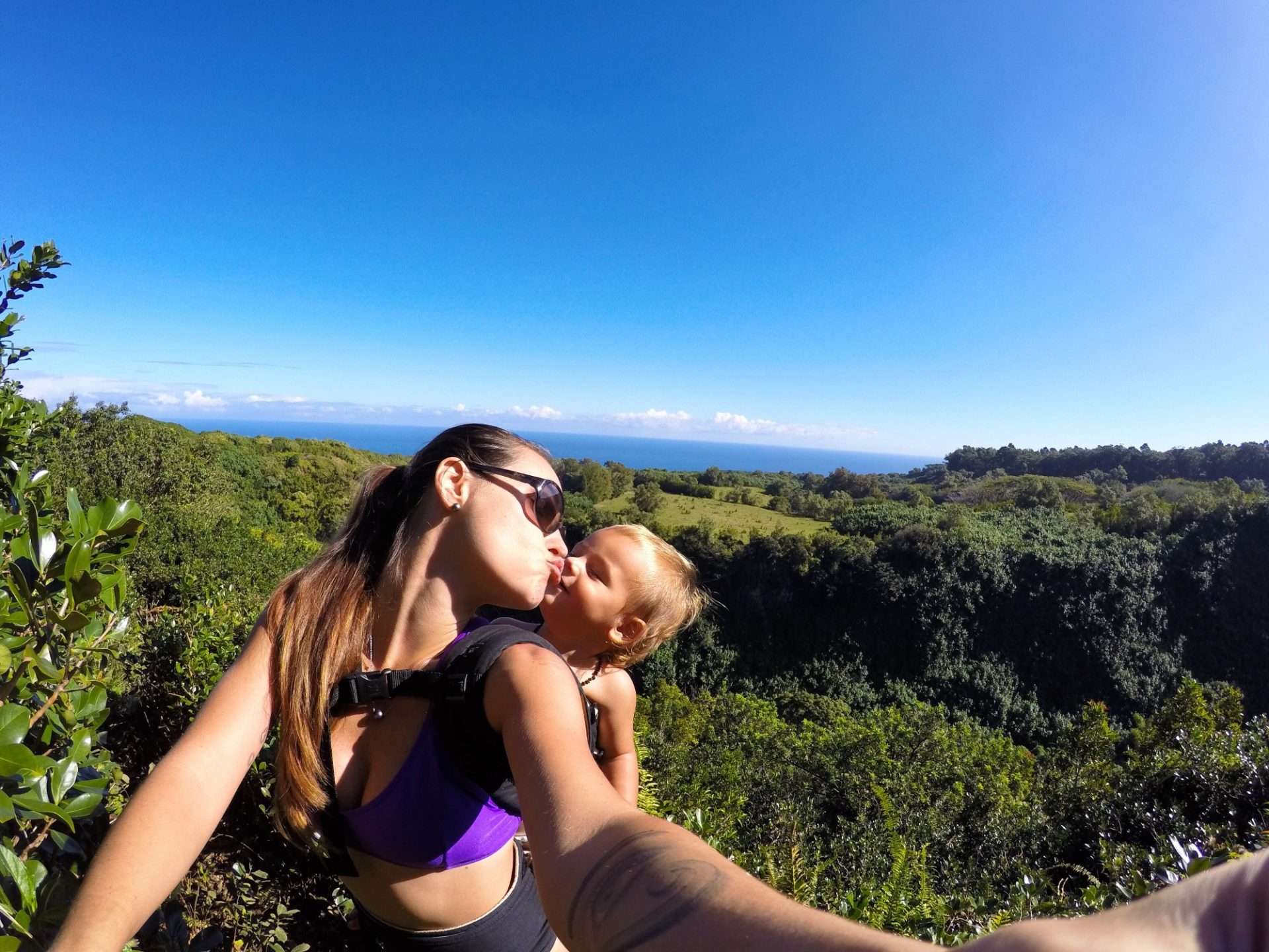 Mom and baby hiking in Hawaii