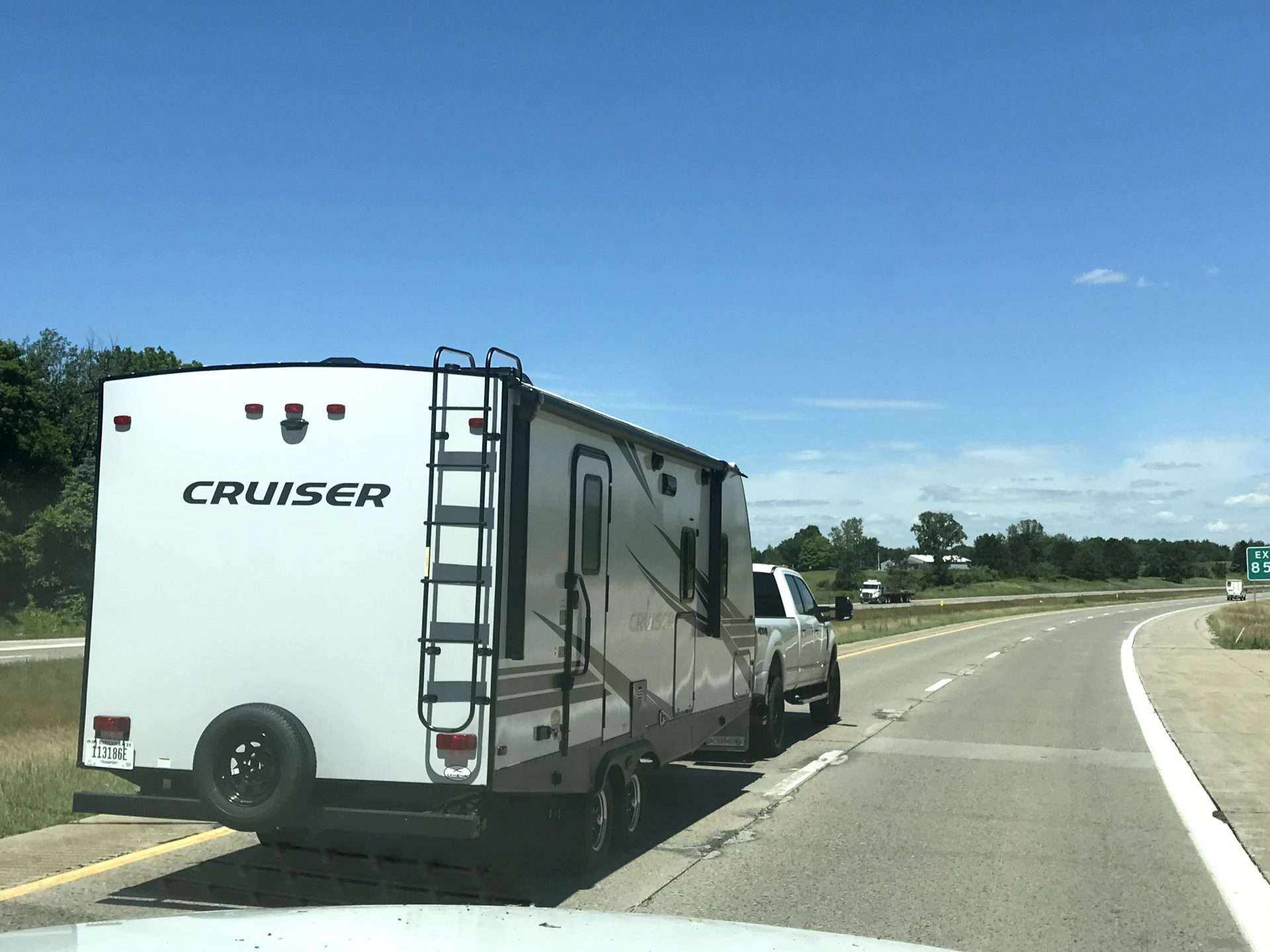 spare tire cover on rv driving down the road