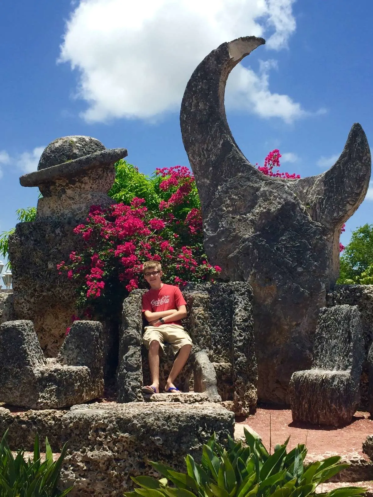 Boy posing at Coral Castle.