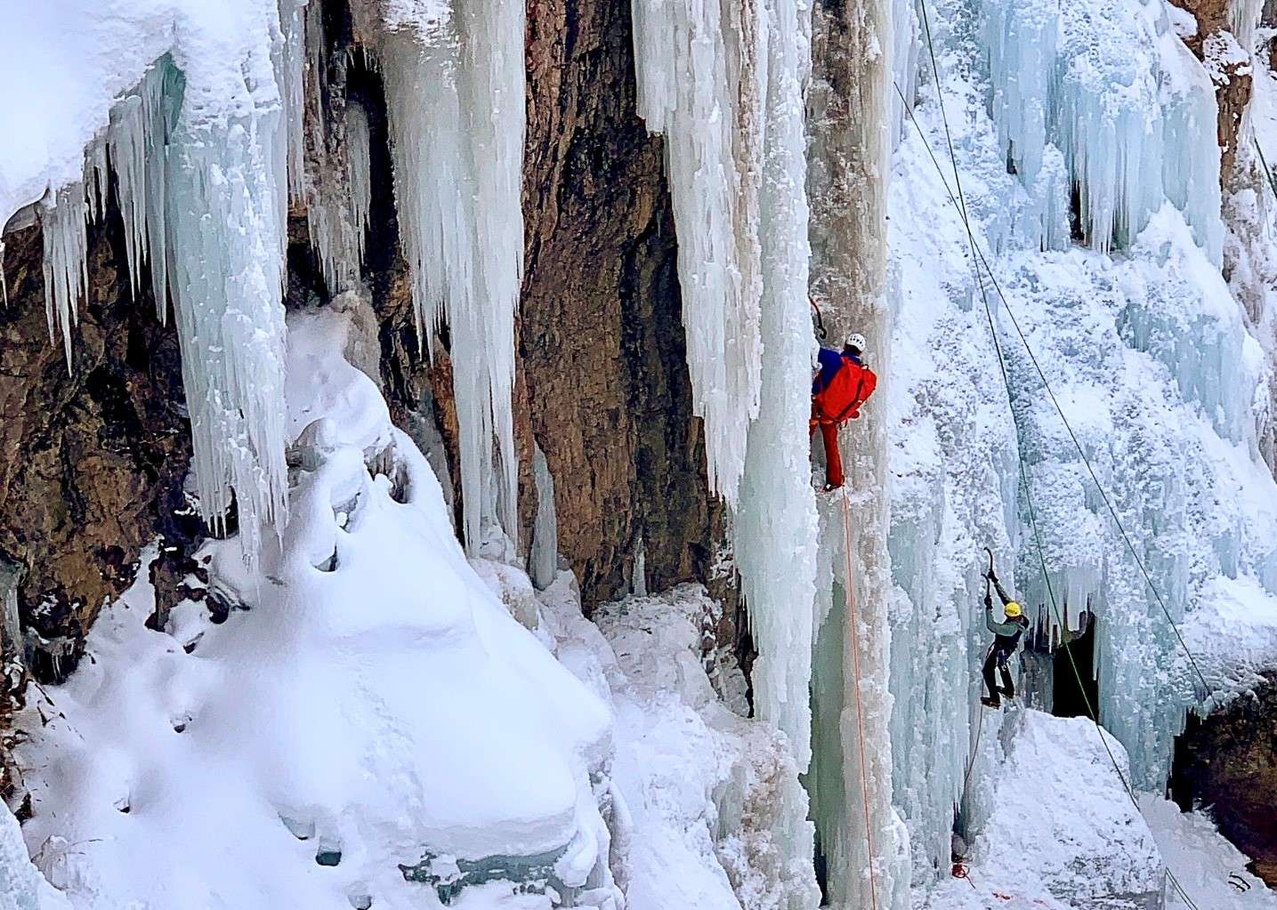 Two people climbing ice in Ouray.