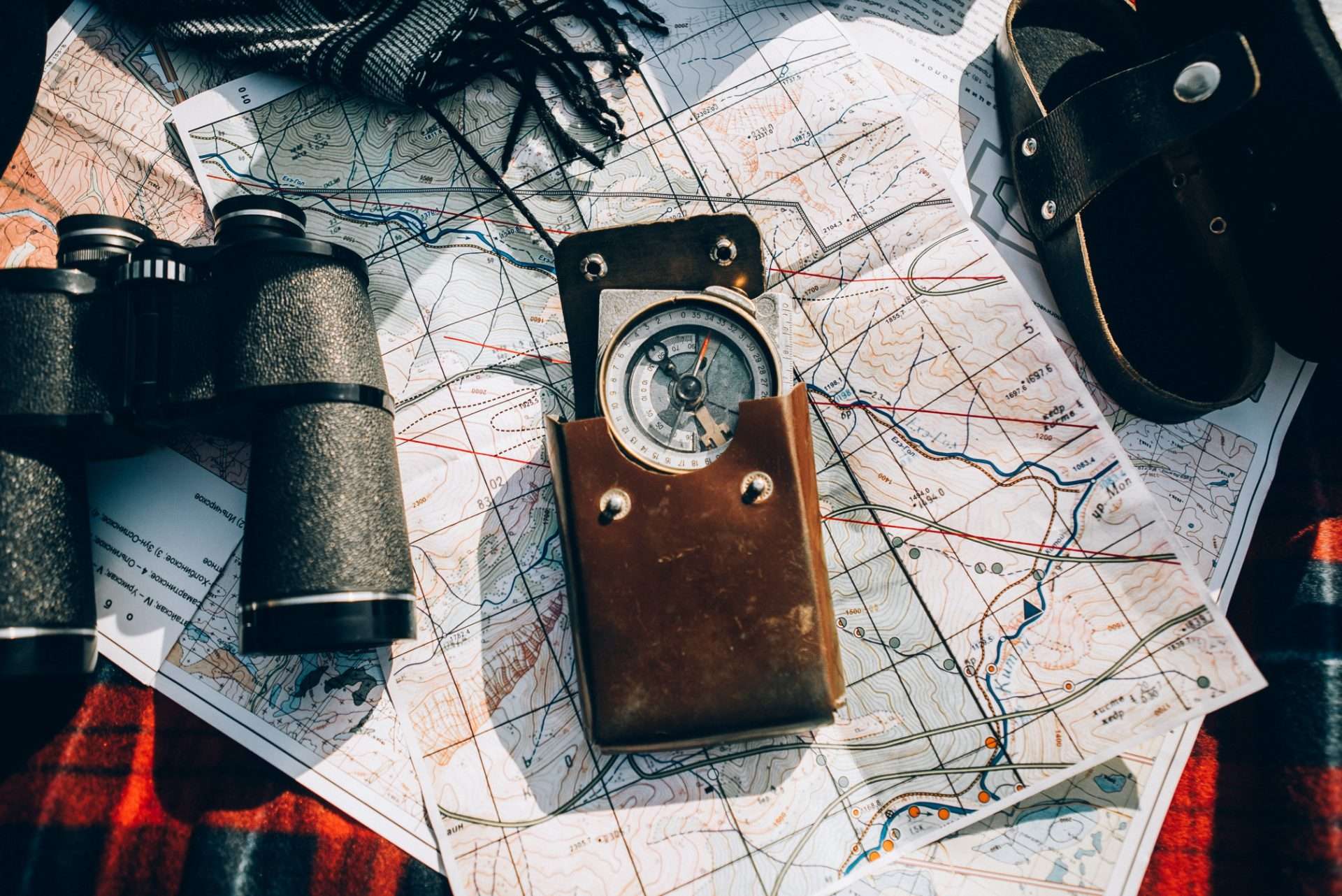 Maps, compass, and binoculars.