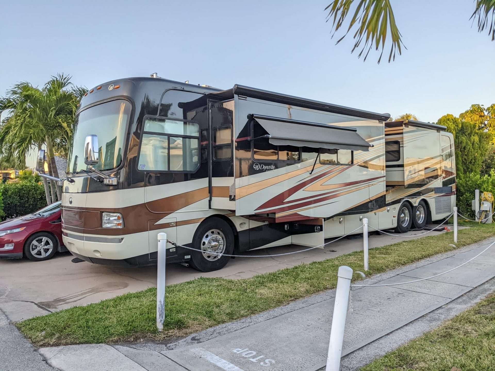 Mortons on the Move Class A RV parked in driveway