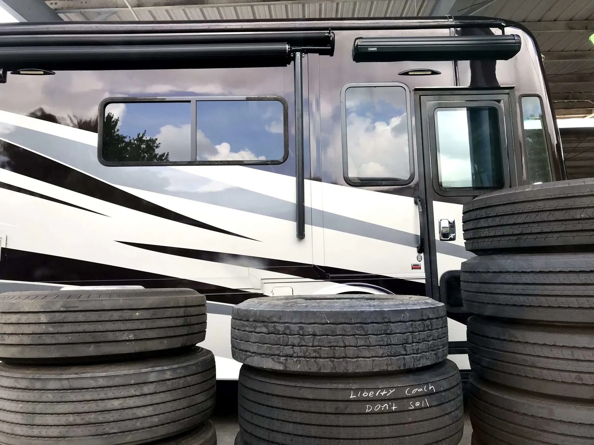 Class A RV at tire repair shop after blowout