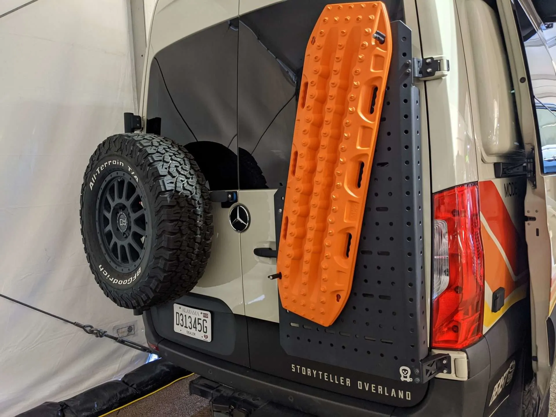 Spare tire mounted on Class B camper van