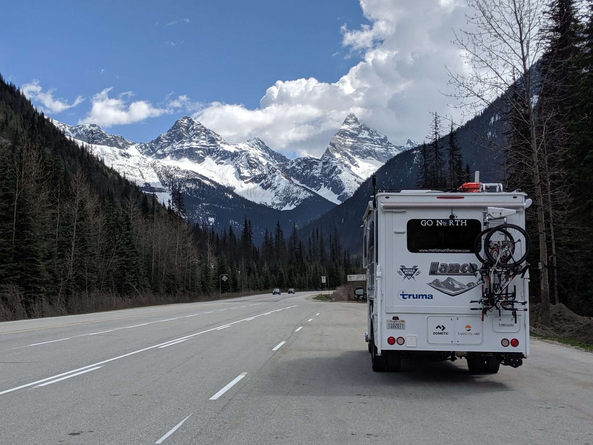 Mortons on the Move Go North camper driving in the mountains of Alaska.