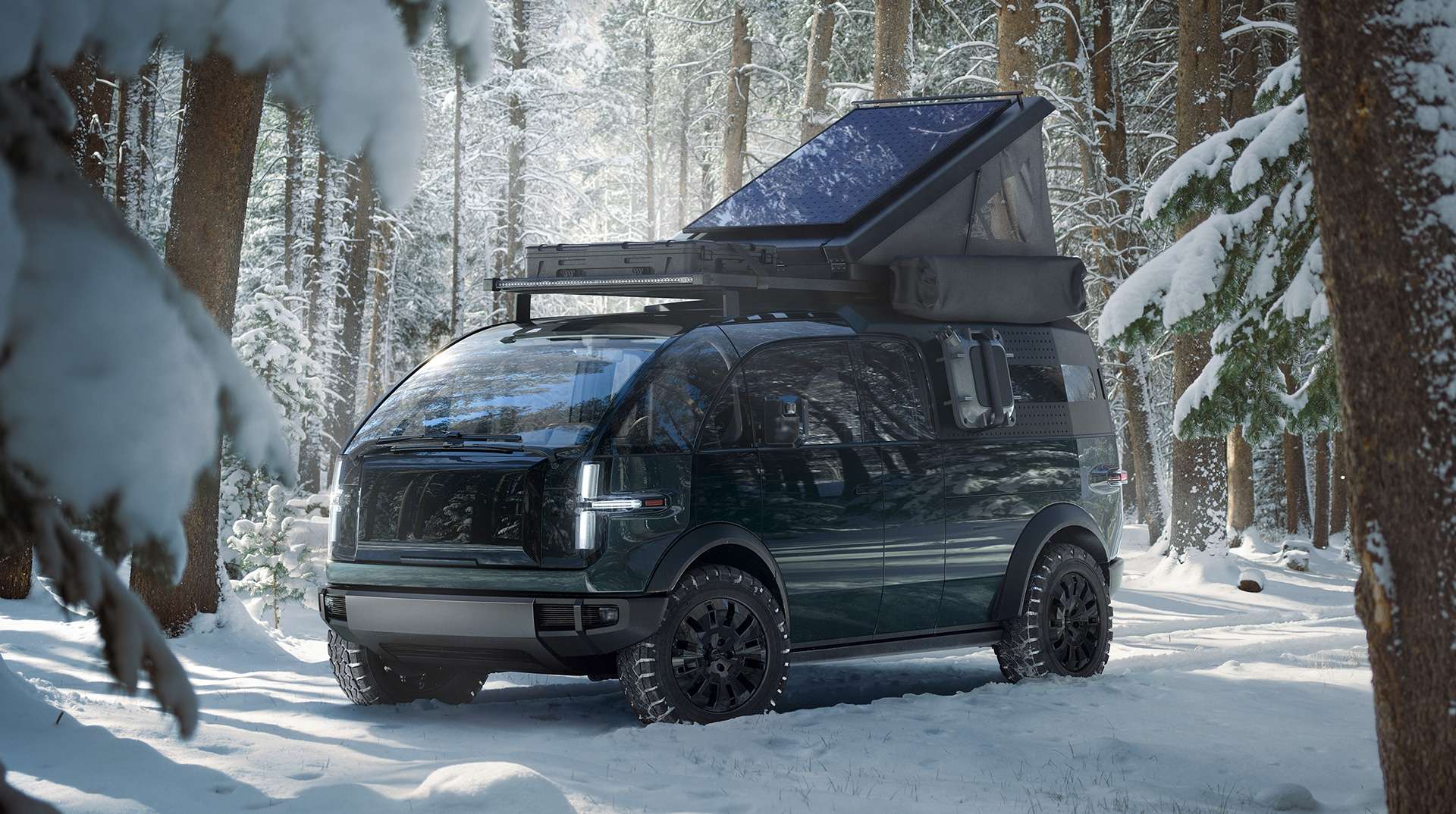 Canoo truck with camper attached in a snowy forest from Canoo website