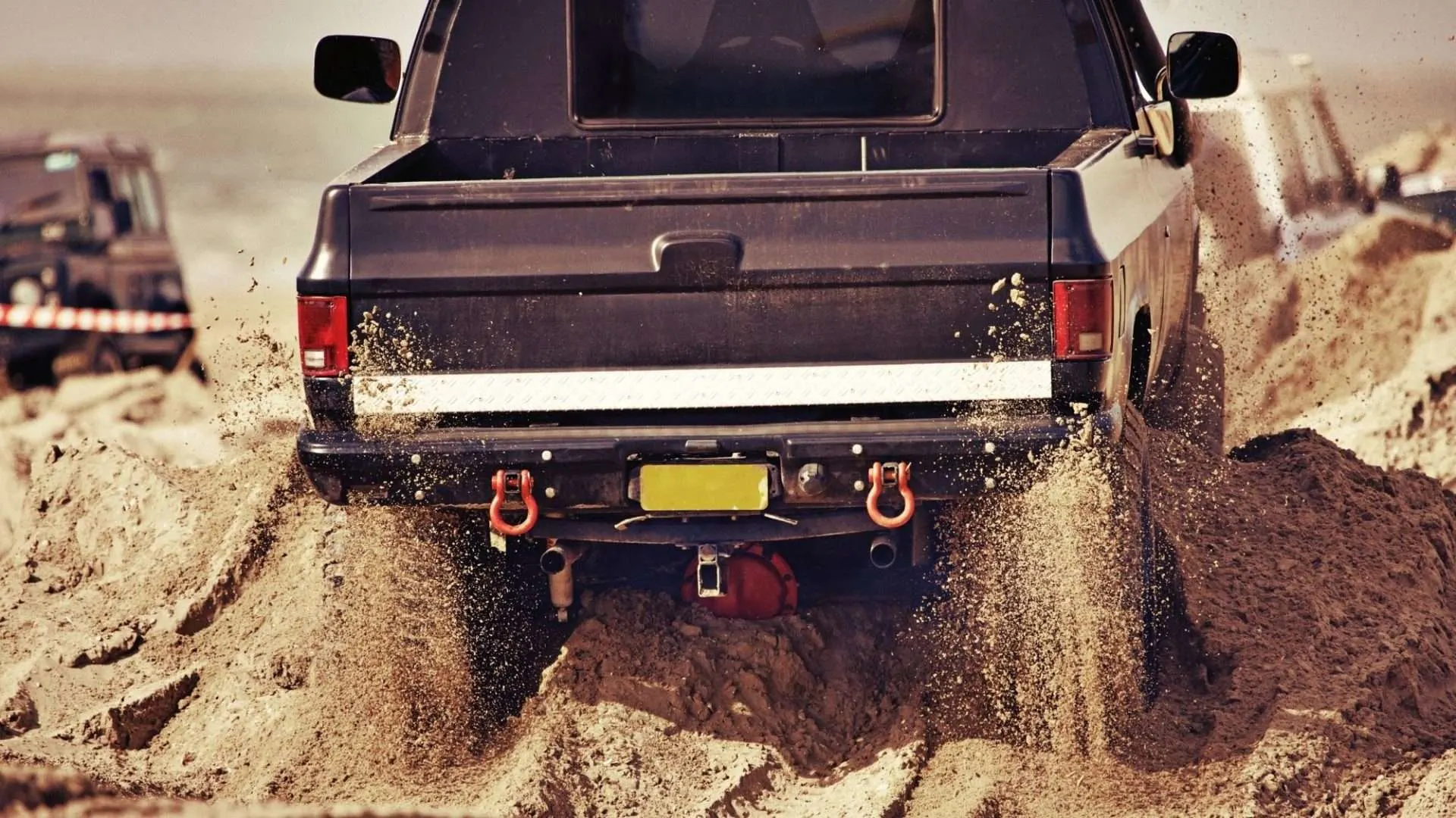 Truck off-roading in sand
