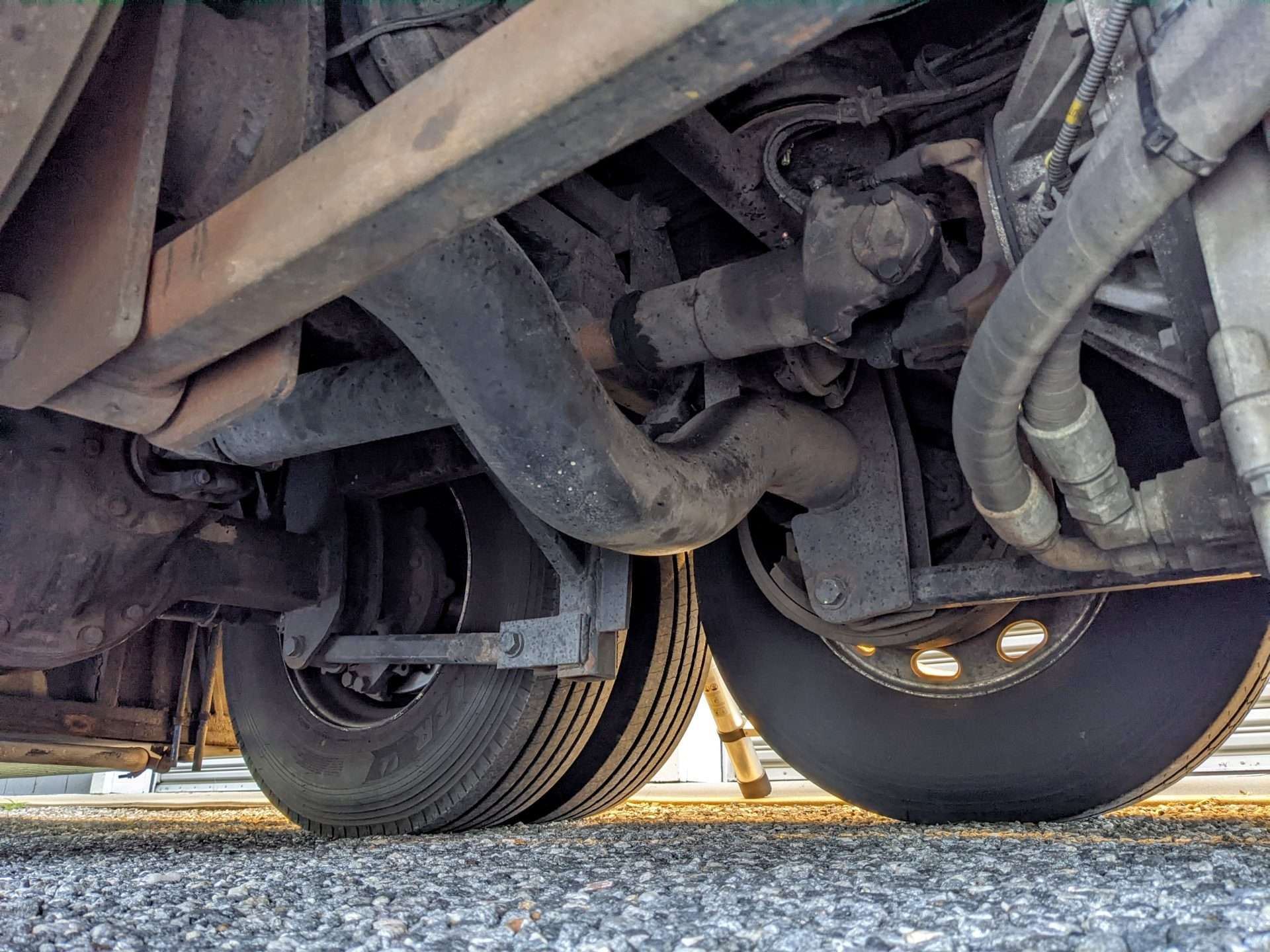 Picture of tag axle from underneath an RV. 