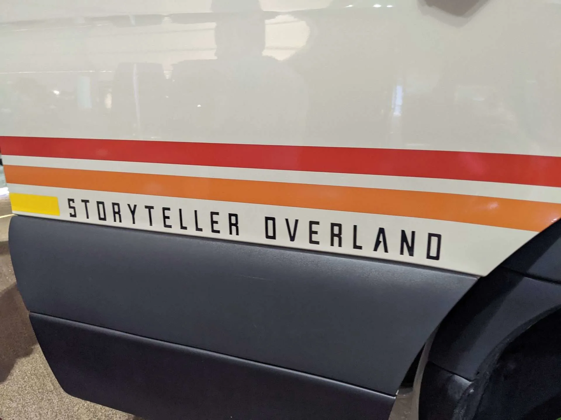 Storyteller Overland van logo on vehicle.