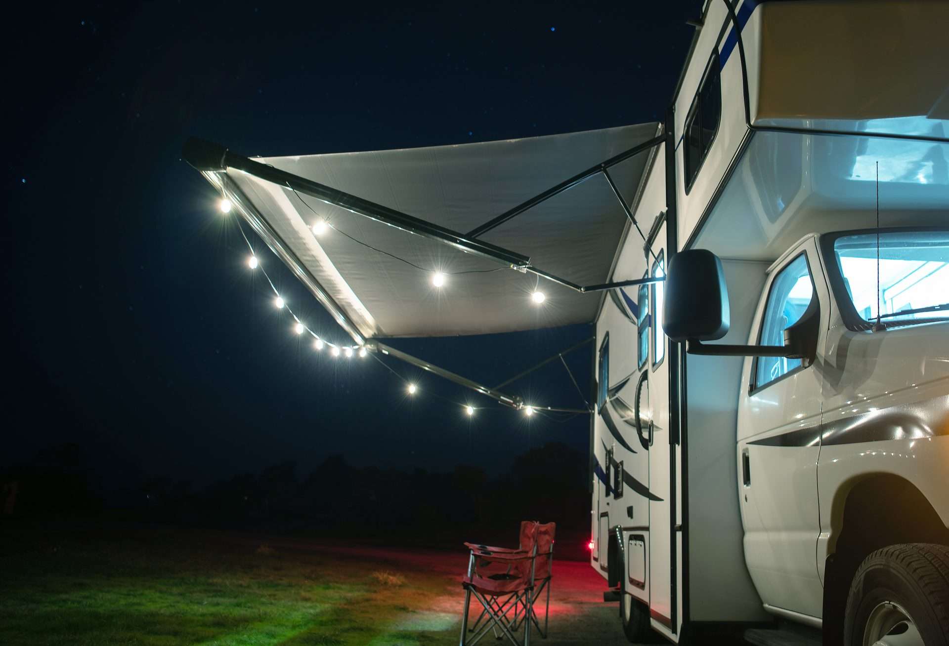 Rv with string lights installed on awning