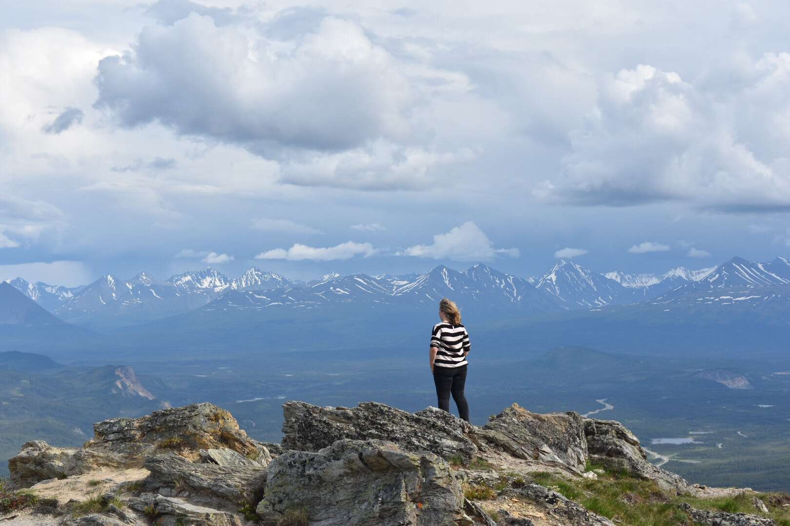 Woman looking out at Mt. Denali