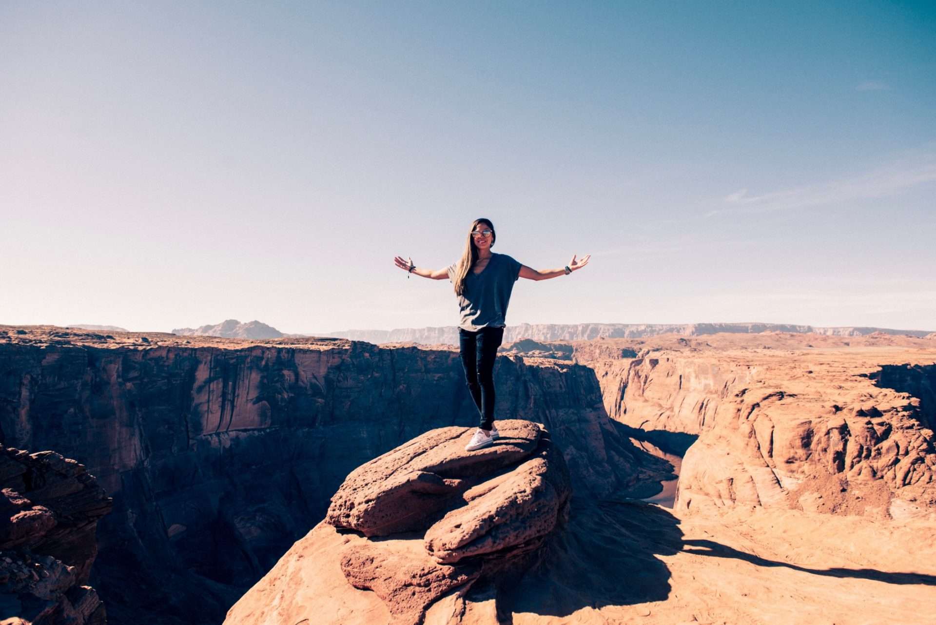 Woman posing at the Grand Canyon in Arizona