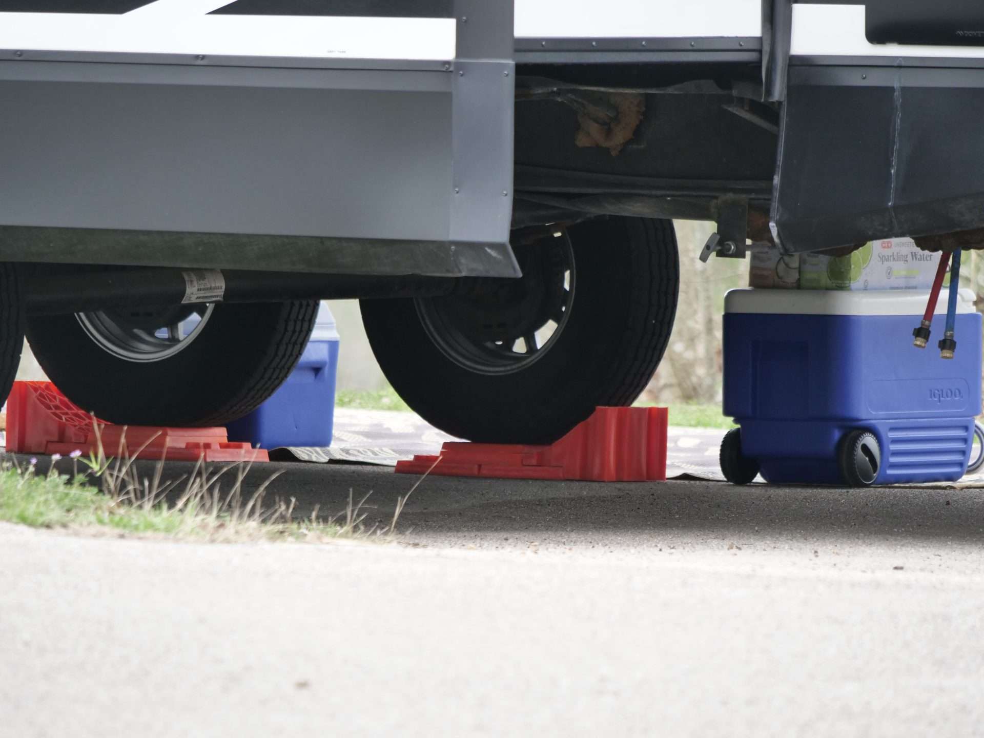Close up of RV wheels parked on block levelers