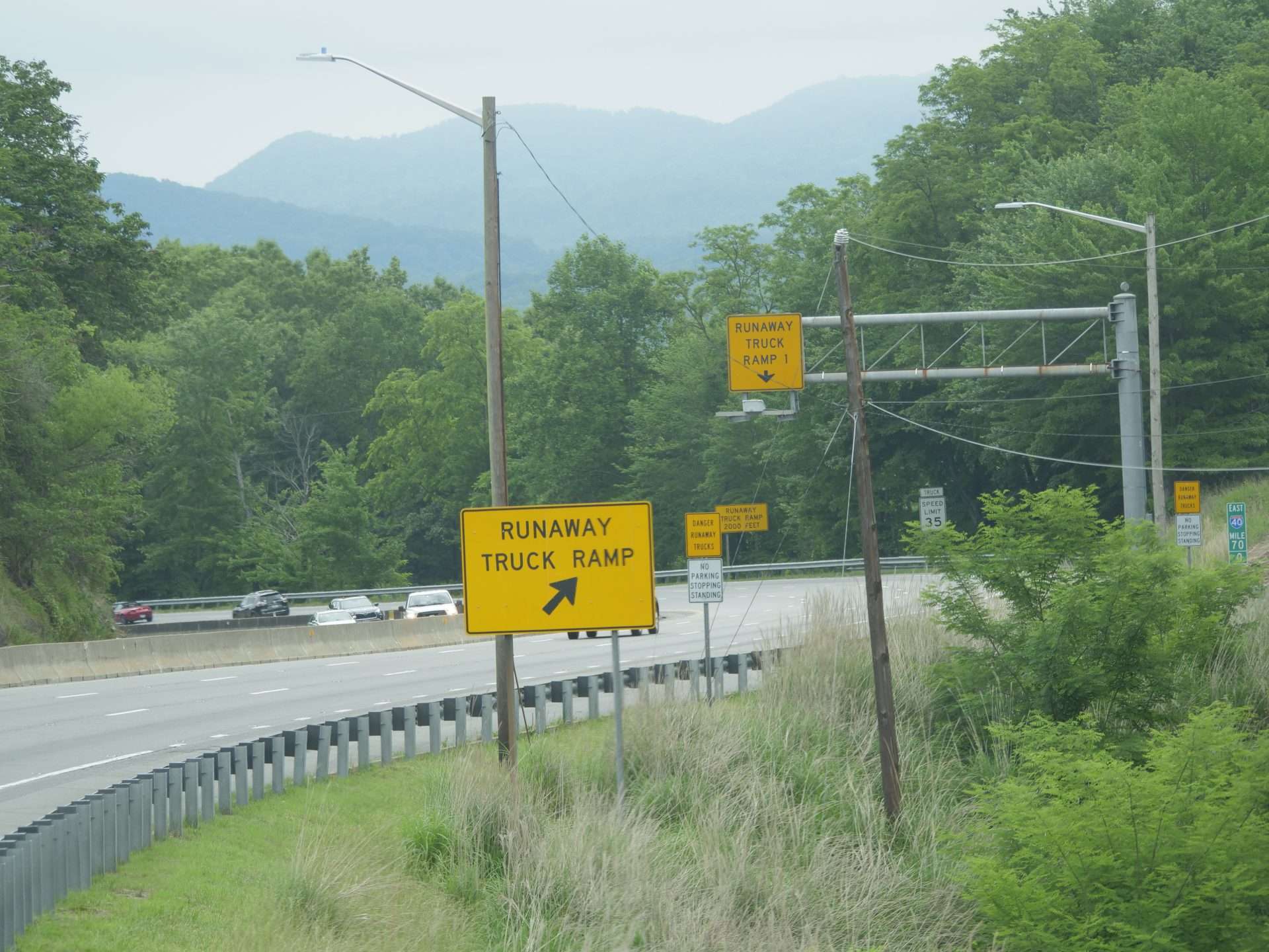 Runaway truck ramp sign on downhill highway