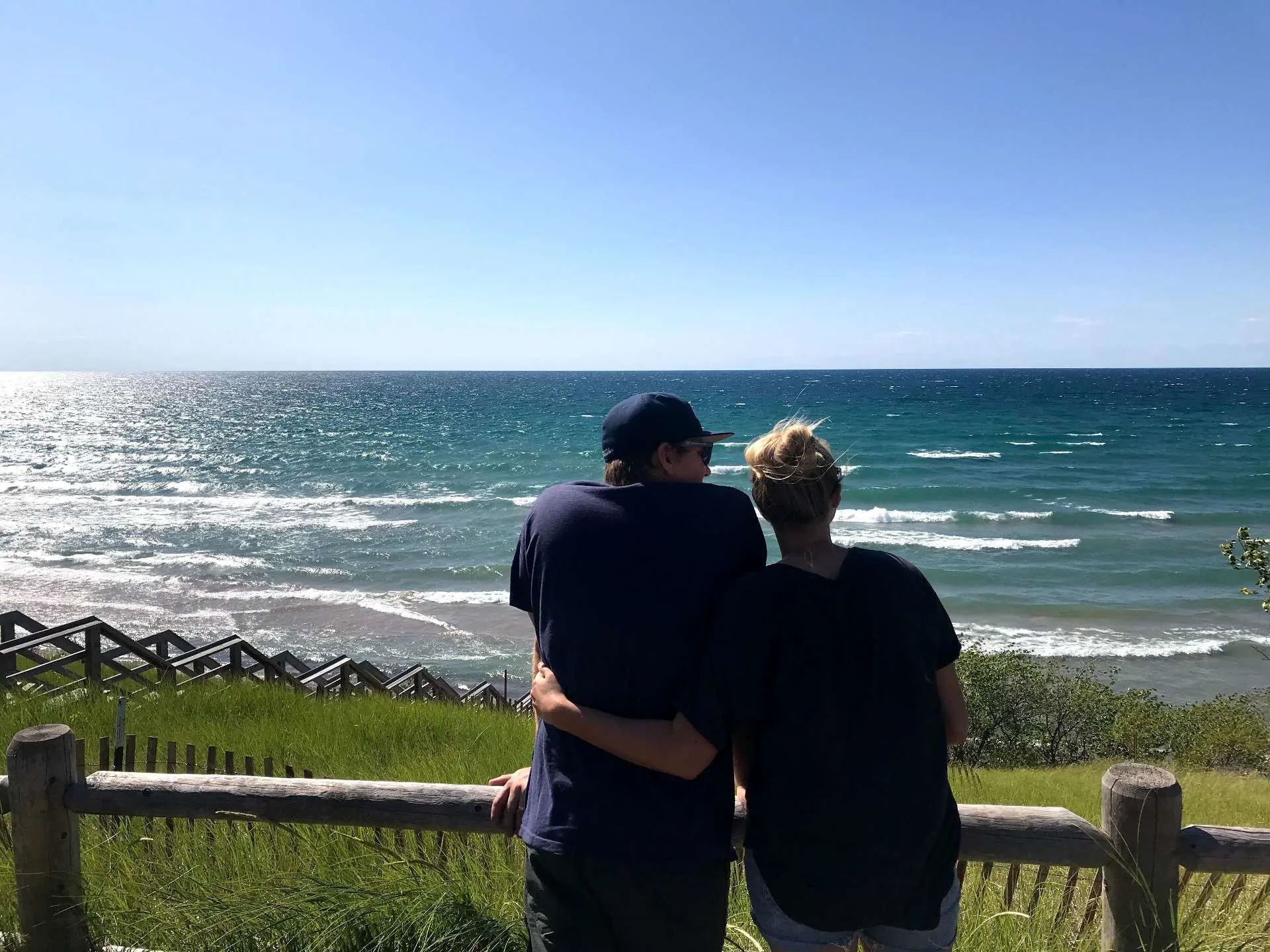 couple gazing out across the great lakes