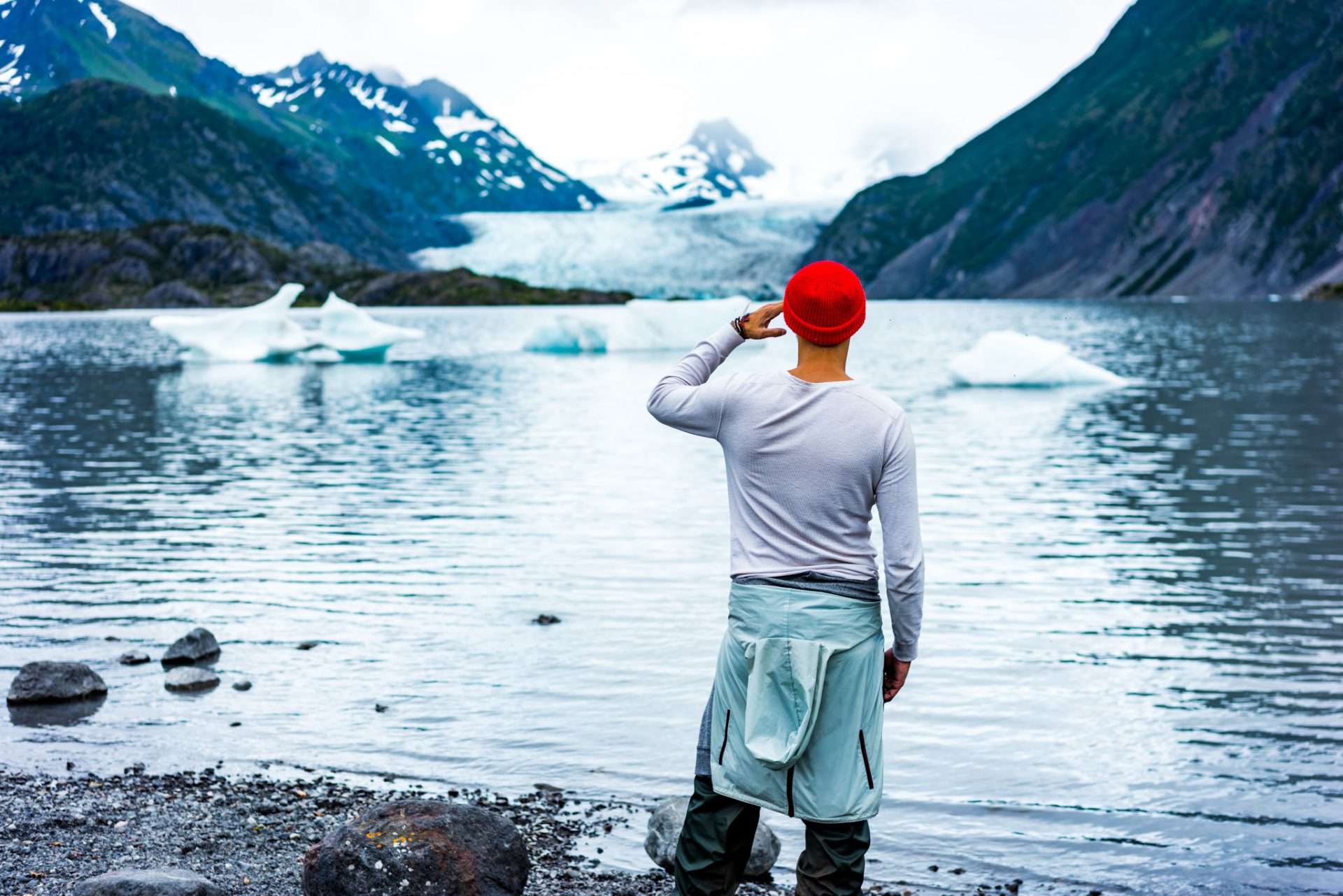 Man looking out at glacier