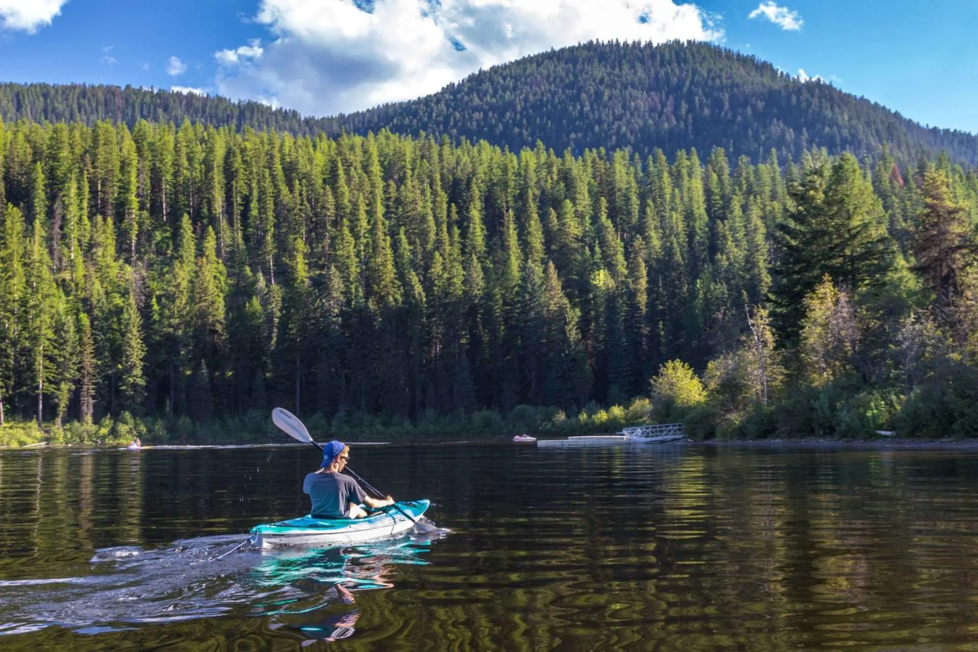 Boy kayaking in lake in Whitefish, Montana
