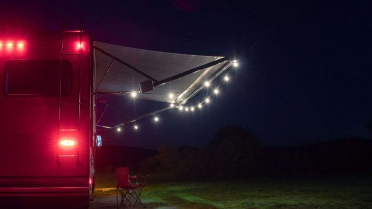 camper with string lights on the awning