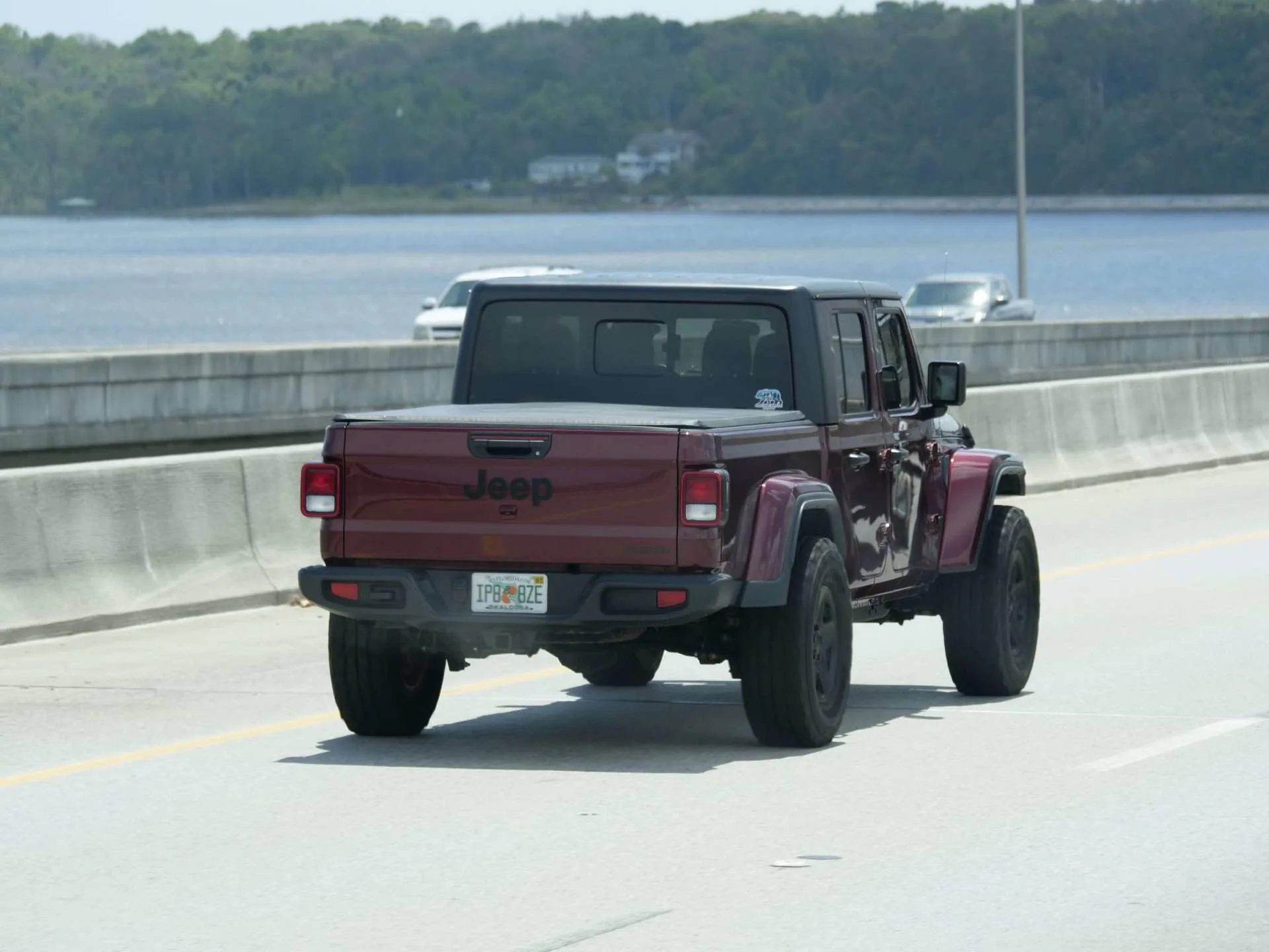 Fuel efficient Jeep truck driving on the highway