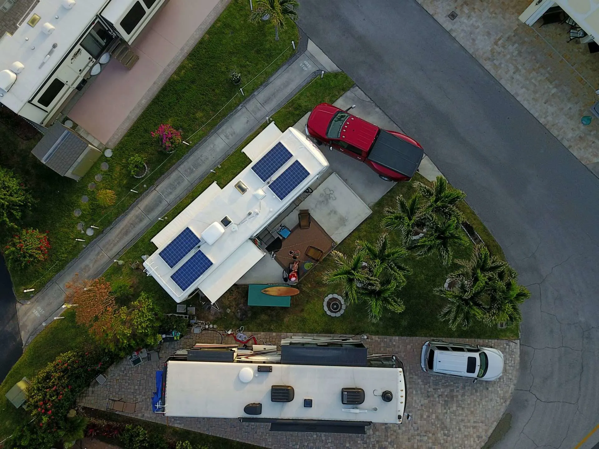 Aerial image of RV parked in a driveway with solar panels installed