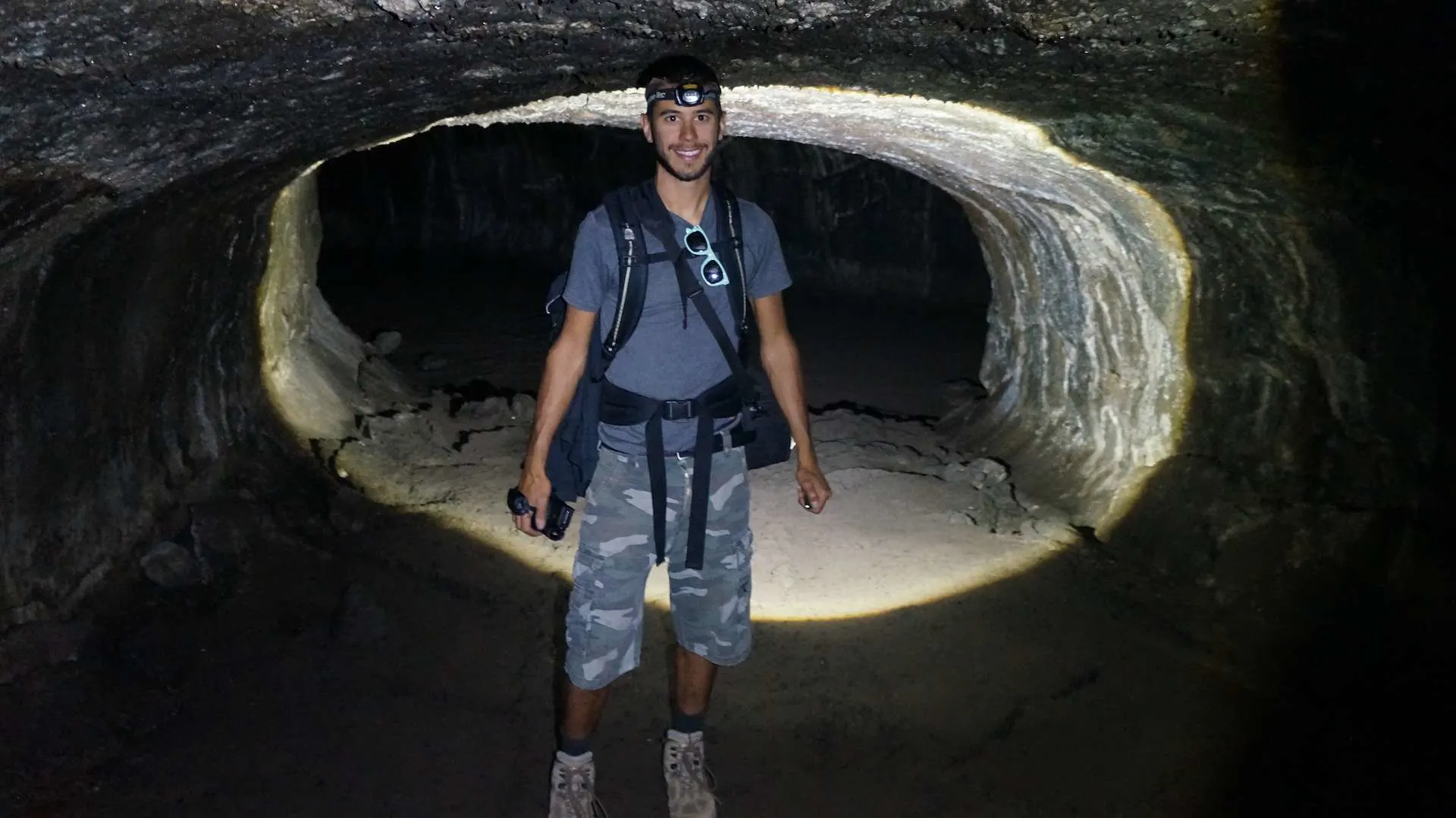 tom standing in a lava tube in northern california