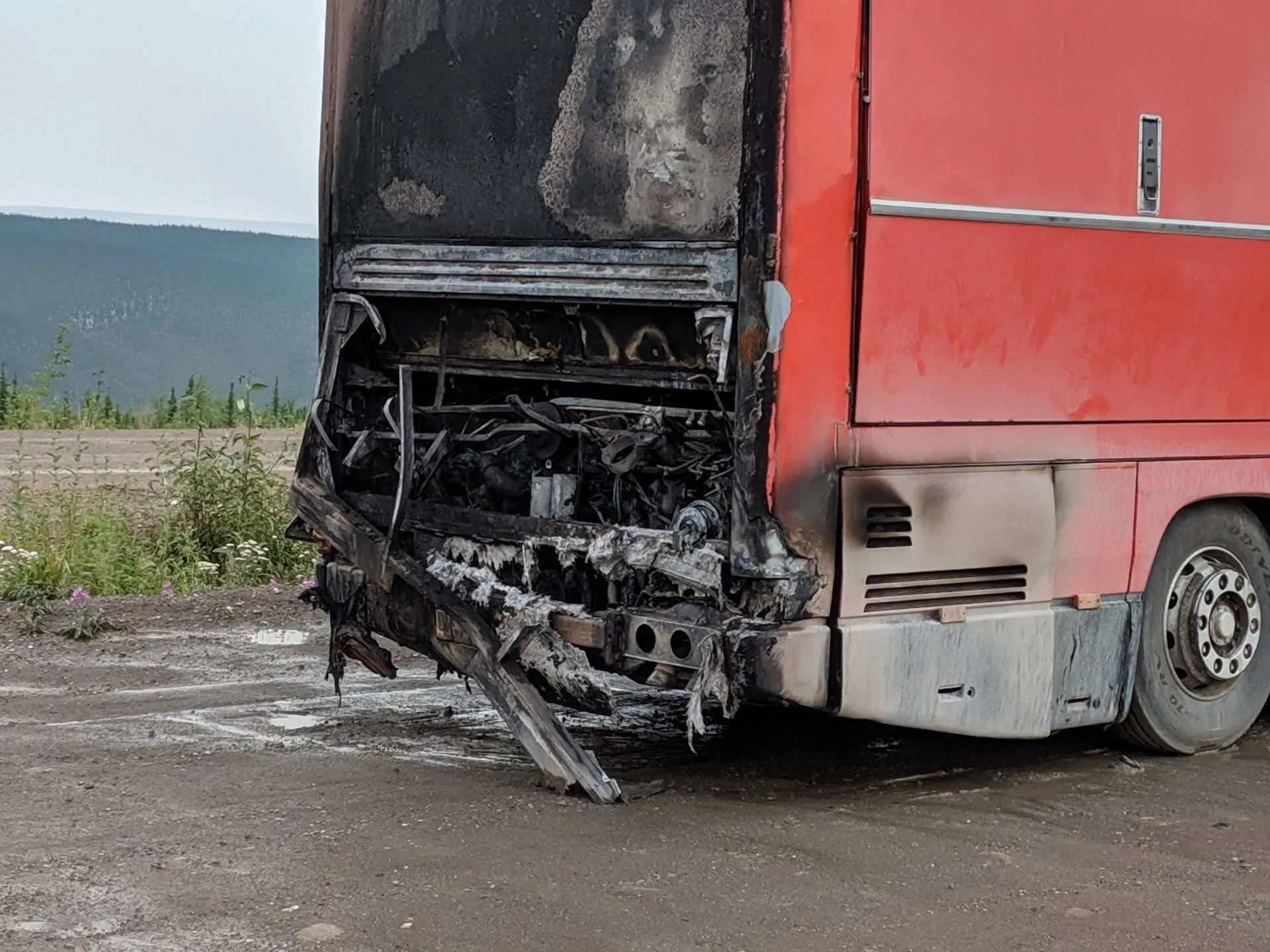 burned class A bus towing